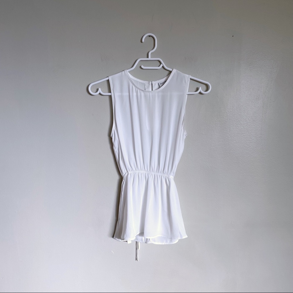 Aritzia Sleeveless White Peplum Waist Top